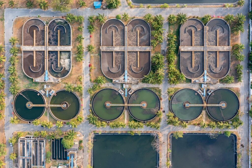 Aerial view of a wastewater treatment plant illustrating the scale and infrastructure that benefit from modern wastewater aeration technology.
