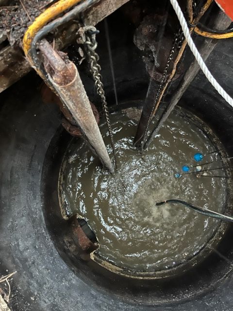 Titus Twister aerator mixing a lift station wet well, keeping FOG and solids suspended instead of settling.
