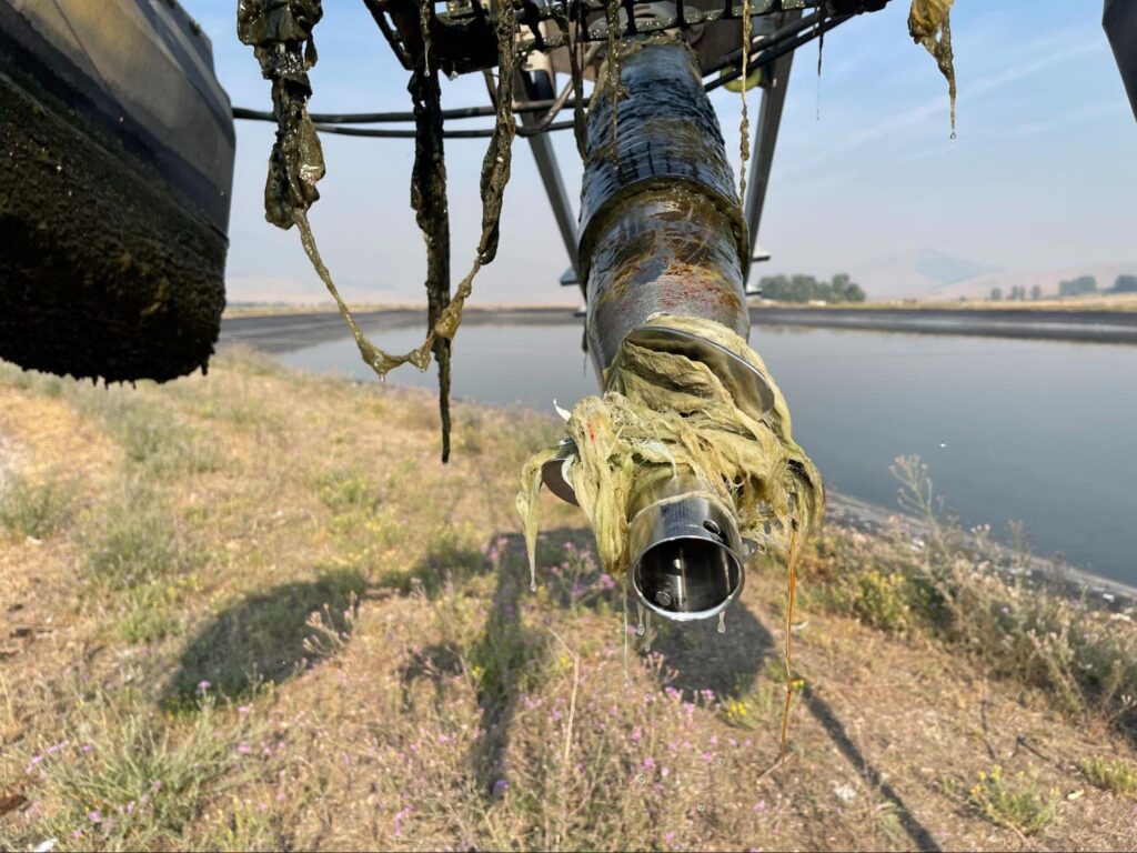 Thick rags and grease wound around an aerator pipe pulled from a lagoon.